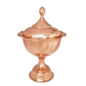 copper chocolate bowl with a rose design