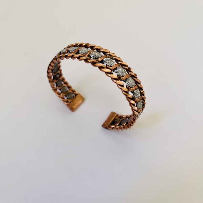 Textured center detail of Interlace Core Copper Bracelet
